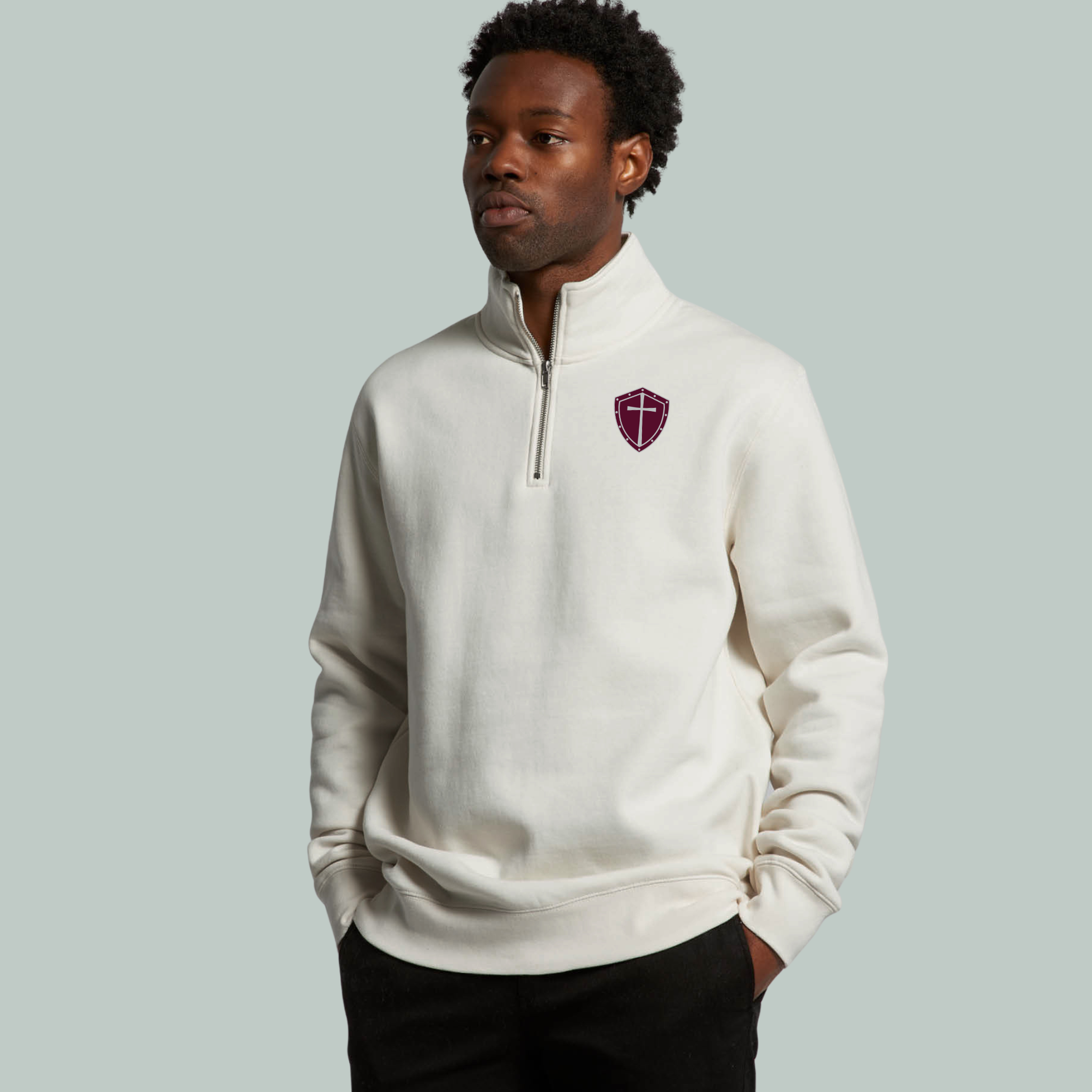 Cadet zip collar in black with the Armor Up patch.