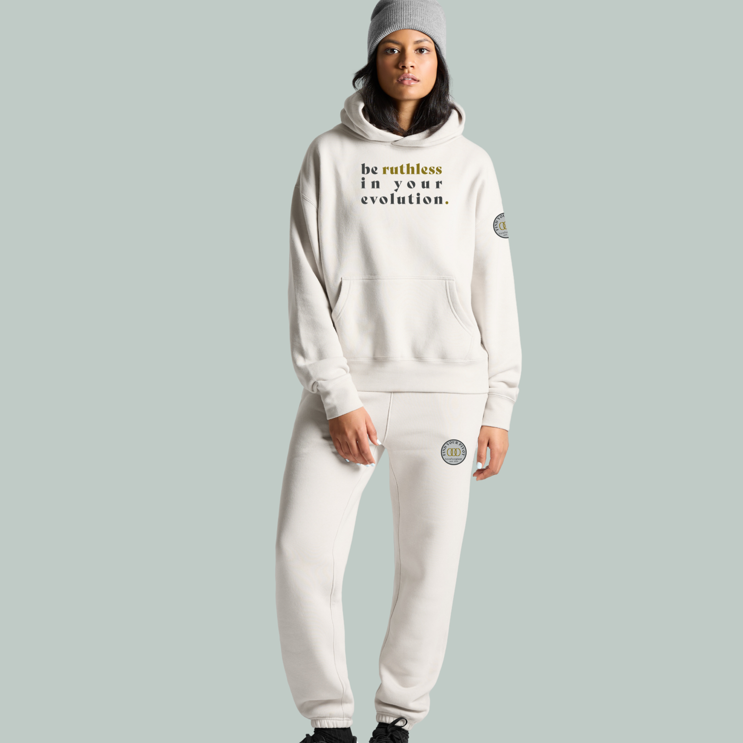 bone colored crop hoodie with redeemed embroidered on the front area